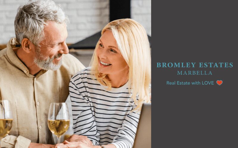 Couple celebrating buying a property in Costa del Sol
